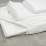 Drap contour blanc rayures ton sur ton 300 fils au pouce par Otelia Maison